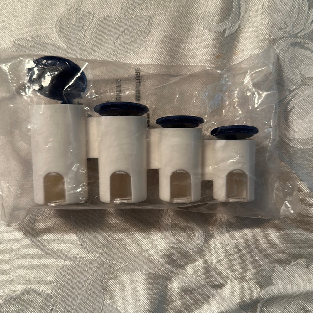 New in bag. Tupperware one touch reminder canister miniature